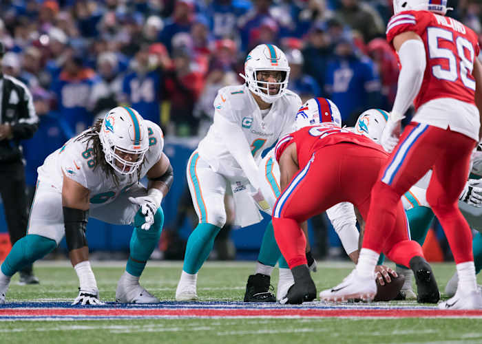 Miami Dolphins quarterback Tua Tagovailoa awaits the snap in a game against the Buffalo Bills.